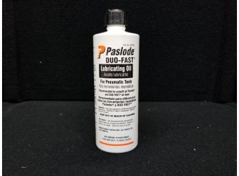 Bottle Of Paslode Duo Fast Lubricating Oil
