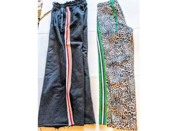 2 Pairs Of Sweatpants (Twins - XS With Stropes Down The Side ) And (Susy M - Animal Print)