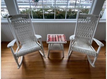 Two Wicker Rocking Chairs And Side Table