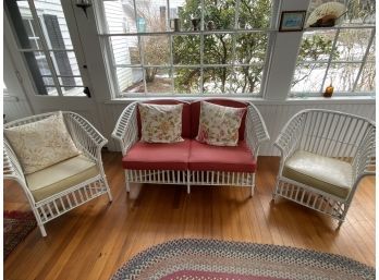 Wicker Loveseat And Two Chairs Stored Indoors Enclosed Porch