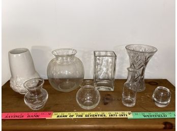 Seven Glass Vases And One Ceramic Of Various Sizes