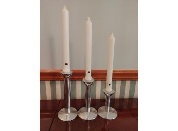 Trio Of Metal Candlesticks With White Colonial Candles (3)