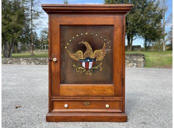 A Vintage Medicine Cabinet With Federal Eagle Motif