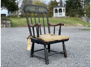 A 19th Century Spindle Back Arm Chair