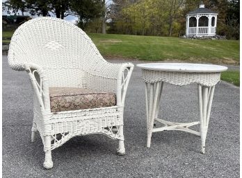 A Vintage Wicker Arm Chair And Side Table