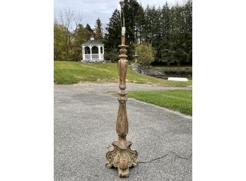 A Large Carved Wood Lamp