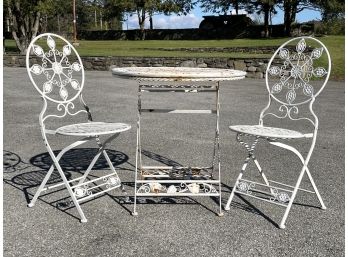 A Vintage Wrought Iron Bistro Set