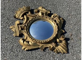 An Antique GIlt Framed Convex Mirror