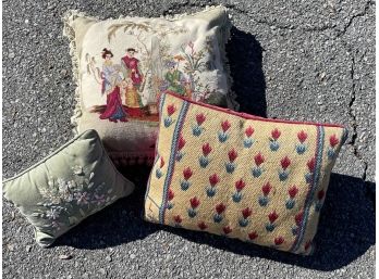 A Trio Of Decorative Throw Pillows