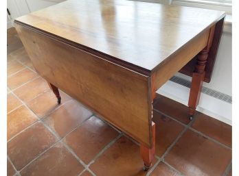 Antique Oak Table With Drop Leaves On Each Side On Casters