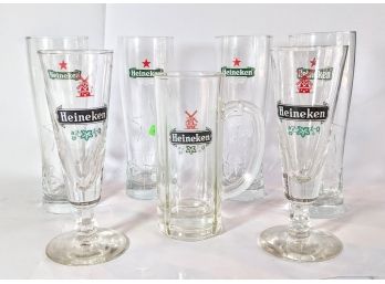 Collection Of 7 Heineken Brand Beer Glasses Heavy Pint Glasses And Tall Footed Glasses