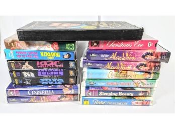 25 Tapes/Movies Mostly Disney Classics Includes Aladdin, Cinderella, Robinhood And More