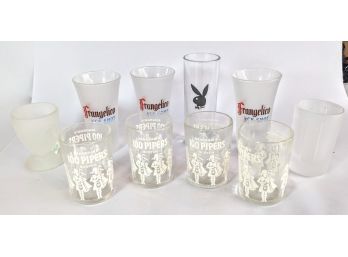 Miscellaneous Grouping Of 8 Heavy Shot Glasses From Frangelico, Playboy, And 100 Pipers 2.5' - 4'