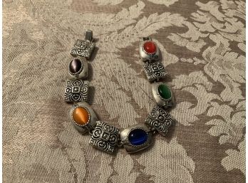 Silvered And Multicolored Ten Disk Bracelet - Lot #47