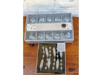 2 Glass Icicle Ornaments, Lux Habitat LED String Lights And Box Of Beautiful Holiday Garland