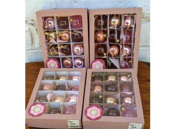 4 Boxes Of ABC Homes Ornaments In Iridescent Shades Of Pink And Gold