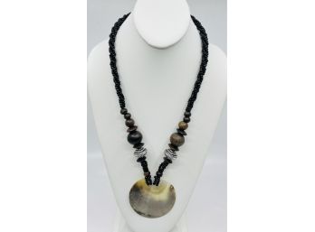 Shell Disc And Black Bead Pendant