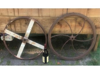 TWO IRON WHEELS