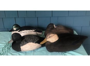 FOUR COMPOSITION DECOYS WITH WOODEN HEADS