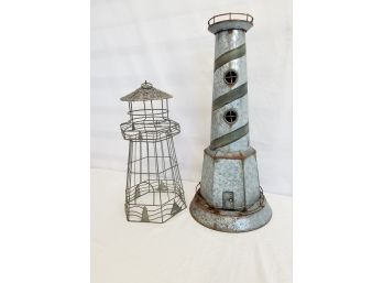 Two Large Decorative Metal Lighthouses