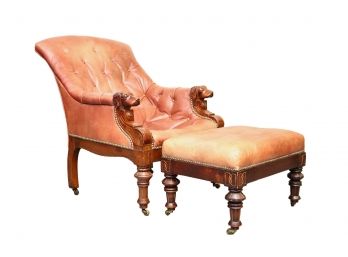 Renaissance Revival Leather Walnut Armchair And Ottoman With Dog Arm Fronts