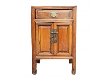 Asian Style Cabinet With Panel Doors And Incised Scroll Block Feet