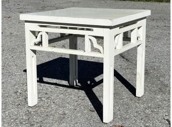 An Antique Painted Wood Cocktail Table