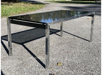 A Modern Chrome And Smoked Glass Coffee Table In Style Of Ben Soleimani