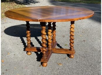 A Notched Hard Wood Drop Leaf Dining Table With Barley Twist Legs By ABC Carpet & Home