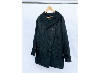 A Men's Coat By Prada