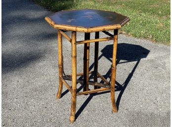 A Vintage Rattan Octagonal Occasional Table With Hand Painted Top