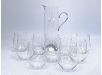 A Cocktail Pitcher And Glasses By Nick Munro