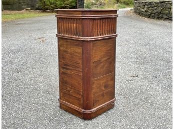 A Carved Wood Umbrella Stand