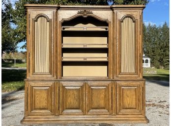 A Large Vintage China Cabinet In Paneled Oak By Auffrance