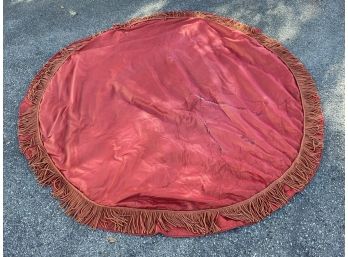 A Large Fringed Table Cloth