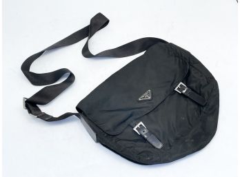 A Messenger Bag By Prada