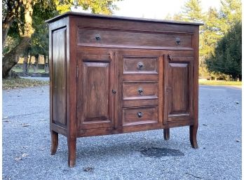 An Antique Paneled Hardwood Console