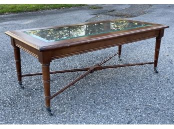 A Glass Top Coffee Table By Lane Furniture