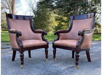 A Pair Of Custom Cherry Wood And Tawny Leather Armchairs With Nailhead Trim