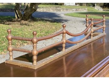 An Antique Brass And Copper Fireplace Fender