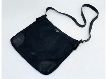 A Leather Accented Messenger Bag By Prada