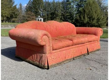 A Large Upholstered Rolled Arm Sofa