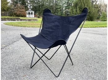 A Vintage Butterfly Chair With Canvas Cover