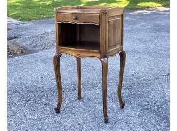 An Antique Mahogany French Provincial Nightstand