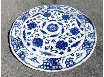 Replace Title With: A Round Modern Area Rug In Traditional Delft Colors By Moooi