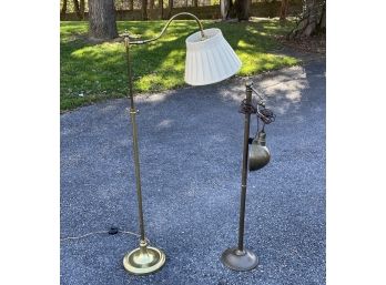 A Pairing Of Brass Standing Lamps