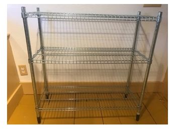 Three 35' Tall Three-Shelf Storage Racks