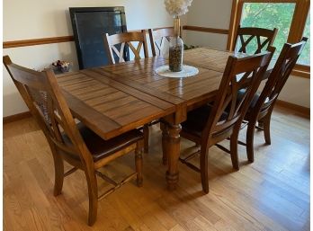 Mixed Wood Dining Room Table & Eight Leather Look Side Chairs