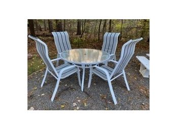 Glass Top Outdoor Table & Four Mesh Fabric Arm Chairs