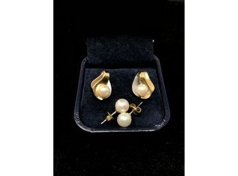 A Duo Of Pierced Earring Pairs With Pearls